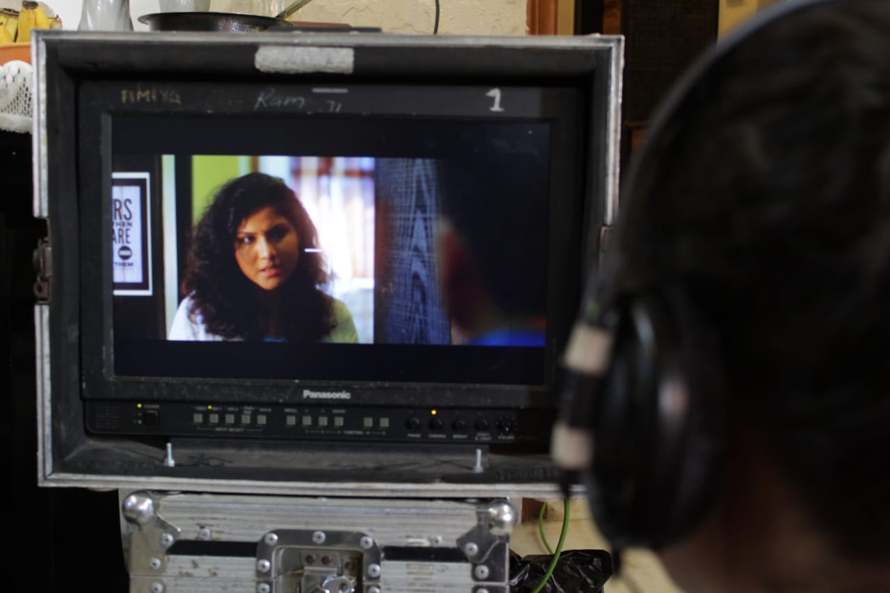 Director reviewing monitor